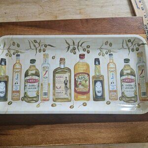 tray made in Italy has different olive oil motifs signed